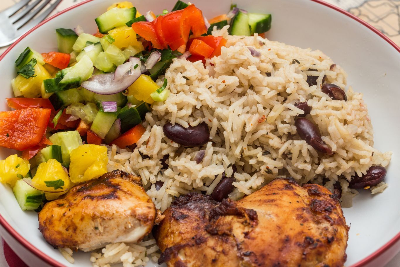 Jerk chicken with rice and peas